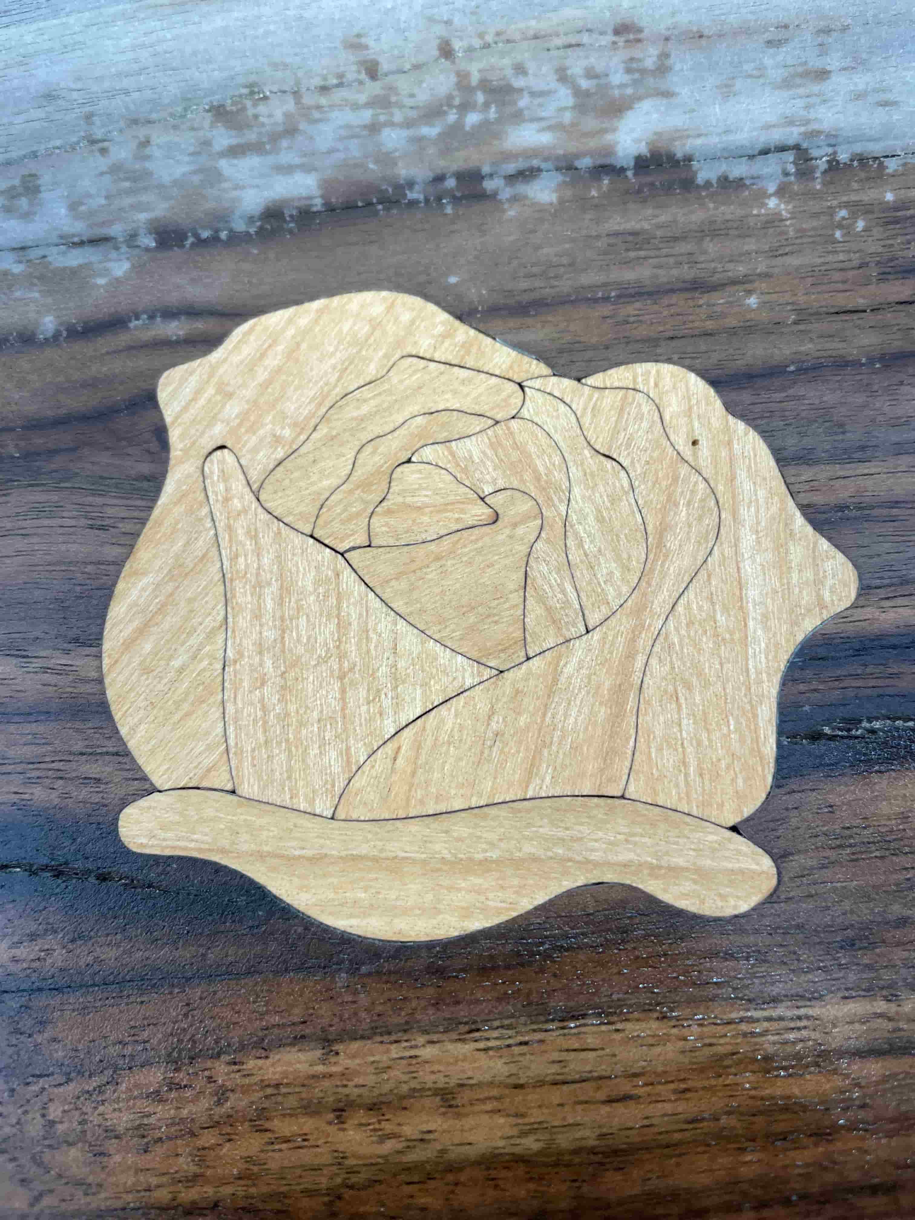 A Slab Stitcher wooden rose inlay