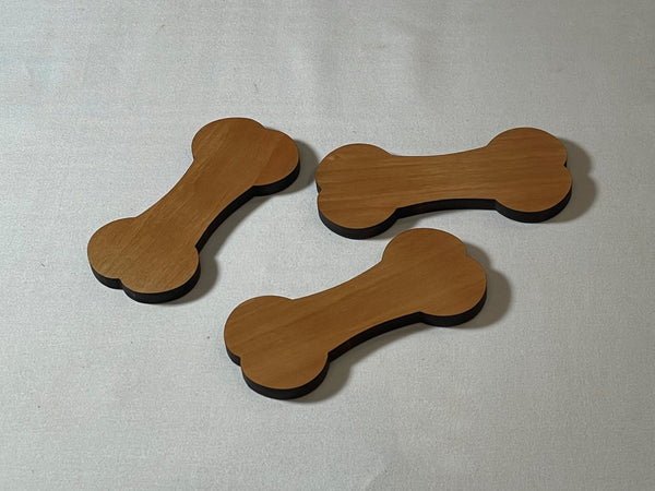 A 3-pack of large cherry wood large original dog bone inlay | Slab Stitcher