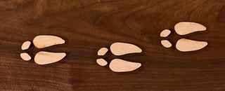 Wooden deer track inlays made by Slab Stitcher