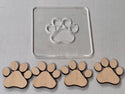 A Slab Stitcher Dog Print Inlay expansion pack that is made of maple wood.