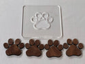 The Slab Stitcher Dog Print Inlay Expansion Pack with dog print inlays made of walnut wood .